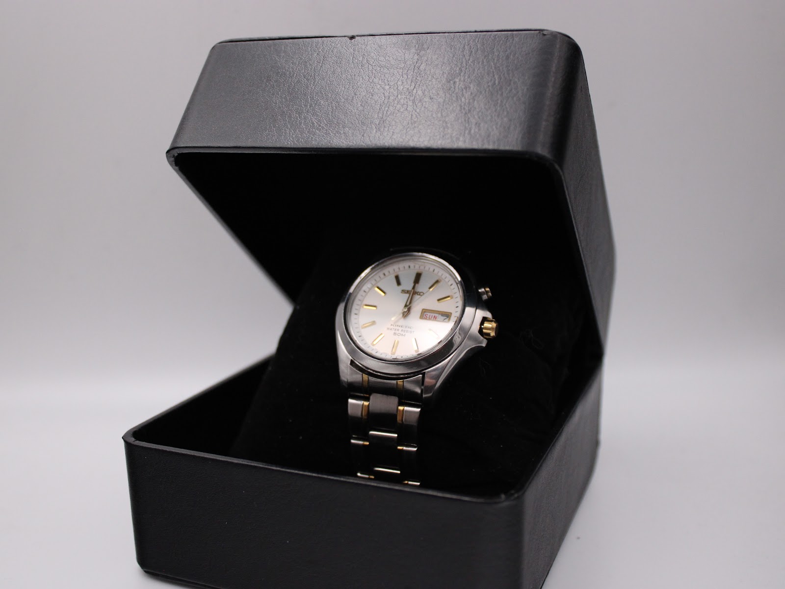 Seiko 5M43-0F30 watch displayed inside a generic black watch box.