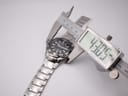 Digital caliper measuring the Seiko watch case diameter at 43.05mm, excluding the crown.