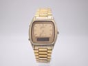 Front view of the SEIKO H448-5000 ana-digi watch with a champagne dial and gold-plated case and bracelet.