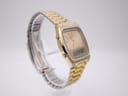 Another angled side view of the SEIKO ana-digi watch, highlighting the side pushers and integrated bracelet design.