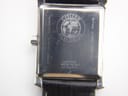Close-up of the stainless steel case back of the Citizen watch, showing 'Citizen Eco-Drive' logo, 'Sapphire Water Resist', model E111-S078105, and serial number.