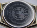 Close-up of the Citizen Eco-Drive watch case back, showing 'Eco-Drive', '681444', 'Base St. Steel', and globe logo.