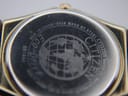 Detailed close-up of the Citizen Eco-Drive watch case back, showing 'S008751 HSB' and 'Citizen Watch Co.'.