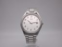 Front view of the Citizen quartz watch with a silver sunburst dial, black Arabic numerals, and stainless steel bracelet.