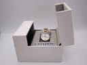 Citizen Eco-Drive watch in its open original white box, showing the rose gold tone watch inside.