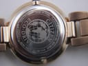 Close-up of the Citizen Eco-Drive watch case back, showing engraved model number S079331, serial number, Eco-Drive logo, and 'W.R. 5BAR'.