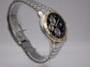 Close-up angled side view of the Citizen watch case and bezel, highlighting the two-tone finish.