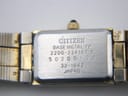 Close-up of the watch case back, showing "CITIZEN BASE METAL YP 2200-224167 K 50200192 JAPAN" engravings.