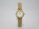 Front view of gold tone Citizen quartz watch with white mother of pearl dial on a clear stand.