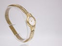 Another angled view from the left side of the gold tone Citizen ladies' watch, highlighting its design.