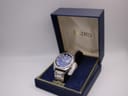 Front view of the Seiko 6119-8273 watch presented in its original dark blue Seiko box with gold interior.