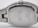 Close-up of the case back engraving, showing "Tissot 1853", model L953, serial 26829, and "sapphire crystal waterresistant 30m stainless steel".