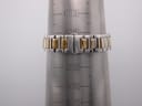 The two-tone bracelet wrapped around a wrist sizing cone, showing a wrist circumference of approximately 14.5cm.