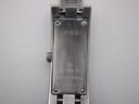 Close-up of the brushed stainless steel case back of the Gucci 110, showing 'GUCCI', '110', 'STEEL', 'SWISS' and serial number.