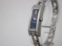 Slightly angled front view of the Gucci 110 with its blue dial and stone markers.