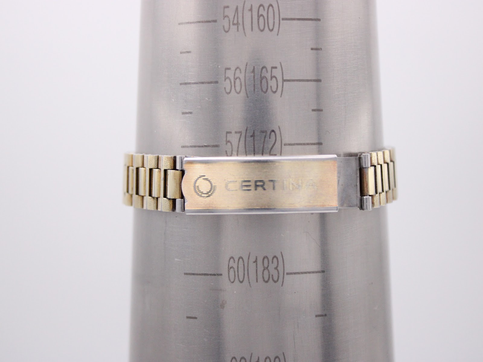 Certina Mayfair watch on a wrist sizing mandrel, indicating a maximum wrist circumference of 172mm / 17.2cm.