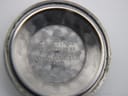 Inside of the Certina watch case back, showing "CERTINA WATCH CORP. SWISS STAINLESS STEEL BACK" engraving.