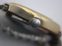 Close-up of the Certina signed crown, showing its textured finish and the watch case side.