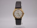 Front view of Raymond Weil 5334 quartz watch with cream dial and gold tone case.