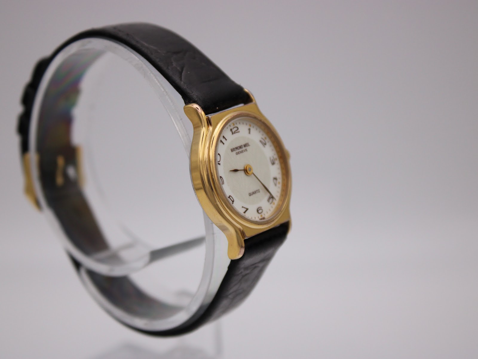 Another angled side view of the Raymond Weil 5334 watch, highlighting the case profile.