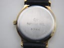Close-up of the stainless steel case back with 'RAYMOND WEIL 5334 WATER RESISTANT' engraving.