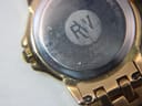 Close-up of the watch case back, showing 'RAYMOND WEIL', 'GENEVE', 'STAINLESS STEEL BACK', 'WATER RESISTANT', 'SAPPHIRE CRYSTAL', '5360', and serial number X238012.