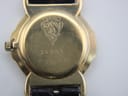 Close-up of the gold-tone case back of the Gucci 3400 L, showing the Gucci crest and model number engraving.
