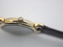 Close-up side view of the Gucci 3400 L watch crown with the Gucci interlocking G logo.