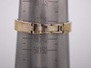 The watch's integrated bracelet measured on a wrist sizing cone, indicating a circumference of approximately 13.8cm.