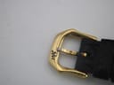 Close-up of the gold-tone buckle, clearly showing the 'RW' brand logo.