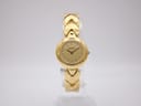 Front view of Alfex 5203 gold-tone ladies' watch on display stand, showcasing the dial and woven bracelet.