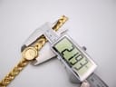 Digital caliper measuring the Alfex watch case, showing a precise diameter of 21.93mm.