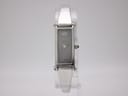 Front view of the Gucci 1500 L watch with a rectangular silver stainless steel case and grey dial, on a white background.
