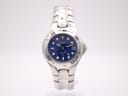 Front three-quarter view of the Bulova Marine Star watch with a blue dial and silver stainless steel case and bracelet, on a white background.