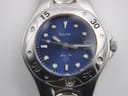 Macro shot of the Bulova Marine Star blue dial, showing luminous dot and baton indices, the date window, "Bulova" and "Marine Star" text, and "100 m" marking.
