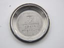 Inside view of the case back, showing 'ACIER INOXYDABLE' (stainless steel), Tissot logo, and serial number '38518-2X'.