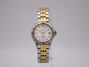 Front view of the two-tone Seiko 1N82-0261 ladies' quartz watch with white dial and gold-tone bezel.