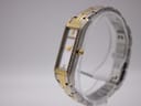 Angled side view of the Roamer Dreamline watch, showing gold crown and crystal-set bezel.