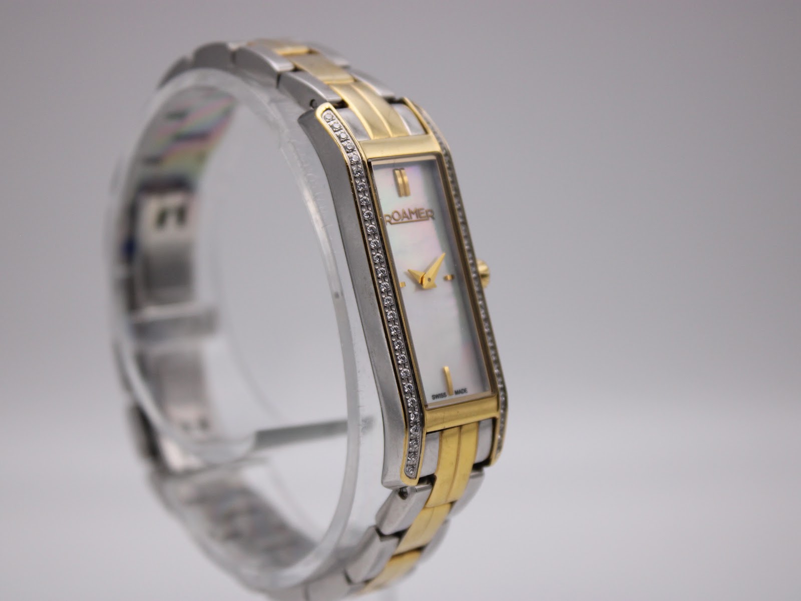 Side view of the Roamer Dreamline watch, highlighting the crystal detailing on the case.