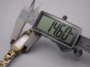Digital caliper measuring the case width of the Roamer Dreamline watch at 14.60mm.