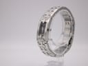 Angled side view of the Tissot L820P watch on a clear stand, showing the curved profile of the integrated bracelet.