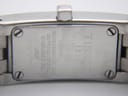 Close-up of the Tissot L820P case back engraving, showing "TISSOT 1853", "Water resistant 30m", "Sapphire crystal", "Stainless steel", "L820P", and serial number "RK6-HA-1180".