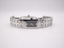 Front view of the Tissot L820P watch lying flat, showcasing the rectangular black dial and the full integrated stainless steel bracelet.