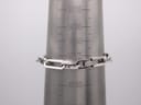 The Gucci 6100L bracelet on a wrist sizing gauge, indicating a maximum wrist circumference of 165mm.
