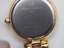 Close-up of the watch case back, showing "Michel Herbelin", "7020.B", "Made in France" and fish logo.