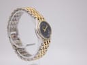Angled side view of the Manin Cartear watch, highlighting the two-tone bracelet and case profile.