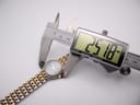 Digital caliper measuring the Manin Cartear watch case diameter at 25.18mm.