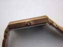Side profile of the MVMT Signature Square watch case, revealing the signed crown with the MVMT logo.