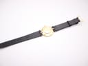 Rear view of the black leather strap, showing 'LIZARD CALF 16' marking the lug width and material.