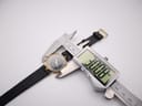 Digital caliper measuring the watch case diameter at 30.8 mm.